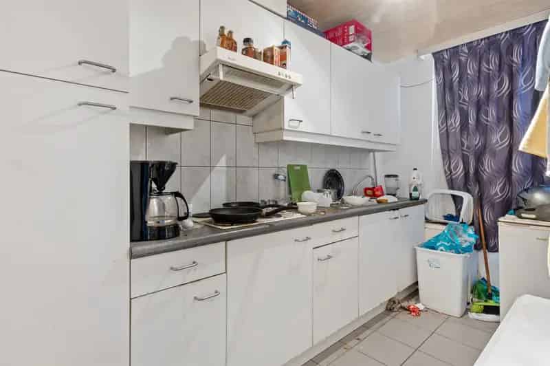 Huis opgedeeld in 4 units op rustige, doch centrale ligging