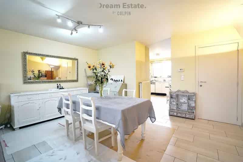 Half open woning met zonnige tuin