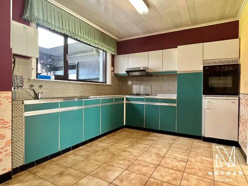 Half open woning te koop op ruim perceel in Ingelmunster!