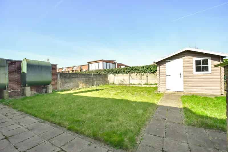 LICHTRIJKE WONING met  3 SLPK - GARAGE EN ZONNIGE TUIN