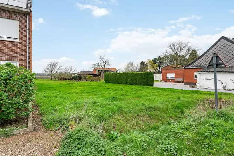 Bouwgrond halfopen bebouwing op perceel van 1090 m² te Putte
