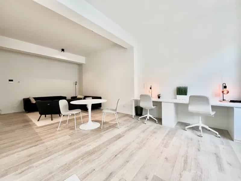 Een STUDIO van ca. 58m² met uitzonderlijke plafondhoogte van 3 meter
