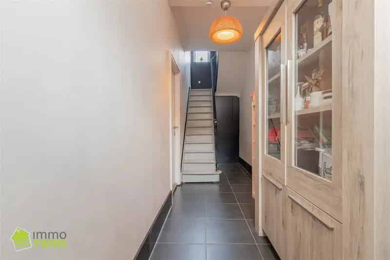 Halfopen gezinswoning met zonnige tuin te Hamme