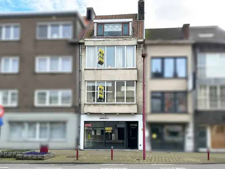 Handelspand met Appartementen Deinze Centrum Te renoveren