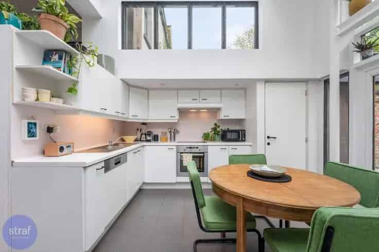Herenhuis te koop Zurenborg: 4 slaapkamers, tuin