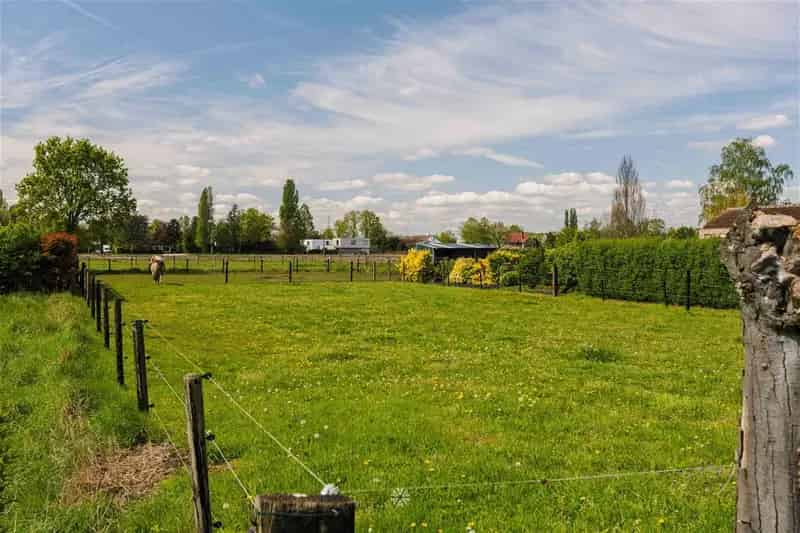 Bouwgrond met achterliggend weiland te koop te Destelbergen
