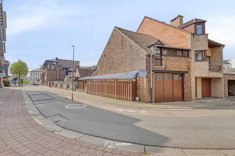 Centrum Asse: ruime handelswoning met terras en grote garage