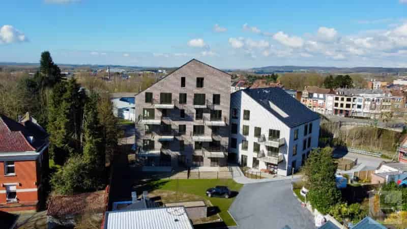 Appartement te huur Ronse: 1 of 2 slaapkamers, terras en garage