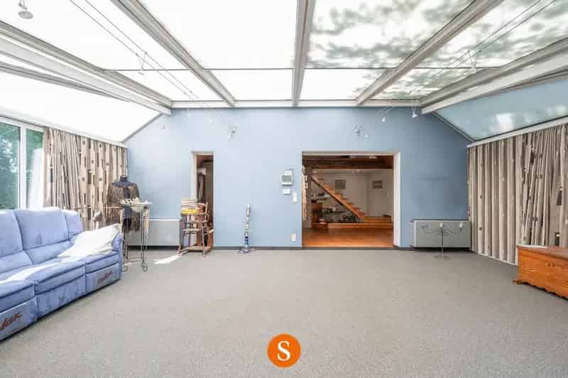 Vrijstaand landhuis op groot perceel en zongerichte tuin.