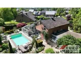 Huis te koop Welkenraedt - Luxe villa met zwembad en tuin