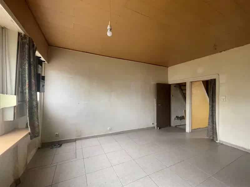 Te renoveren woning met tuin in Boom