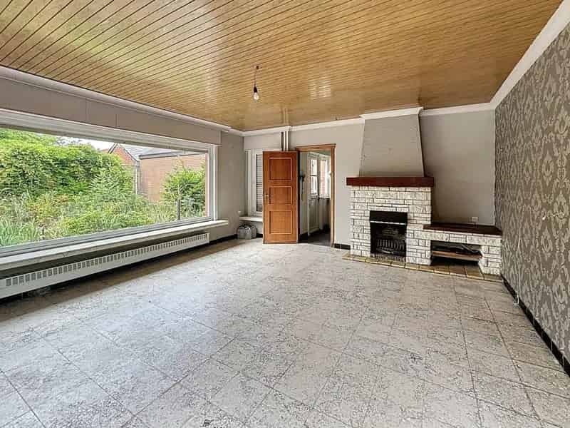 Te renoveren woning op afgesloten perceel van 936m²