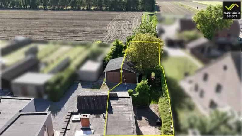 Vastgoed Select: Halfopen bebouwing met zonnige tuin, garage en renovatiepotentieel in Eeklo