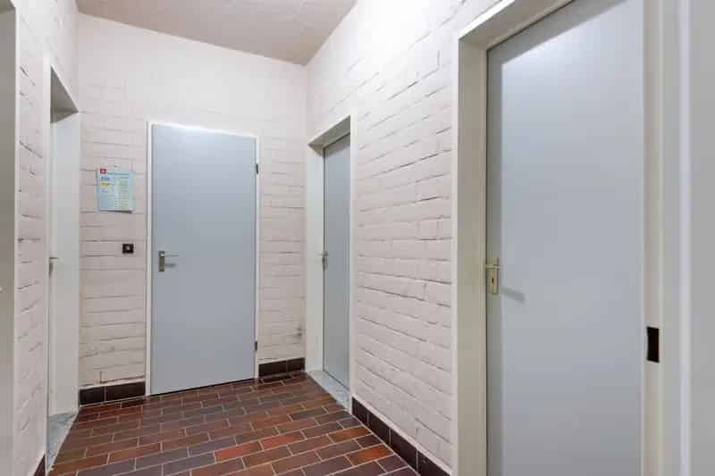 Goed onderhouden opbrengsteigendom met 4 appartementen en magazijn met tuin