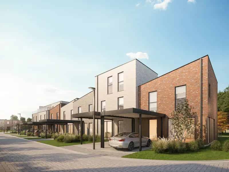 Woning met 3 slaapkamers en tuin met bijgebouw en carport