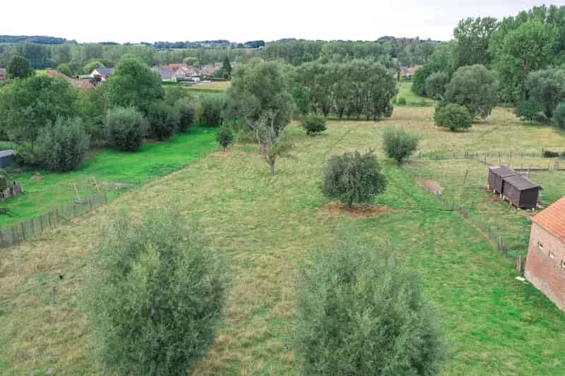 Bouwgrond 7a13 met zicht op velden en weiden.