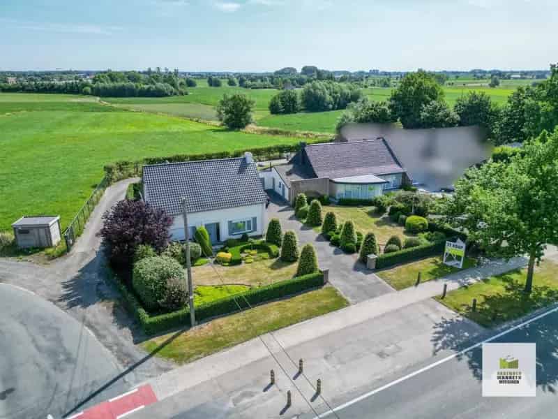 Woonhuis met 4 slaapkamers en polyvalent bijgebouw
