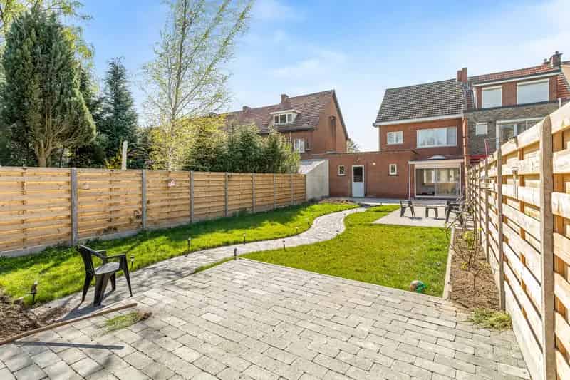 Halfopen bebouwing te Turnhout 3 slaapkamers garage tuin