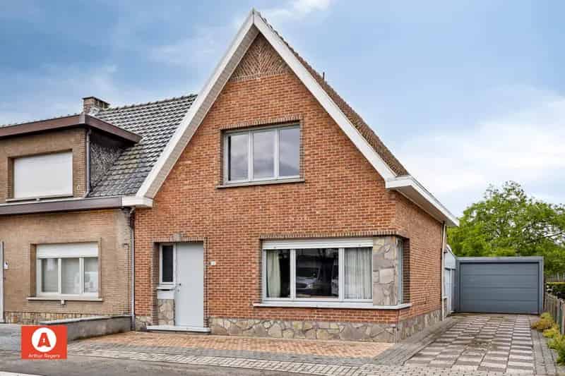 Half-open bebouwing mét ruime garage en tuin in Opdorp.