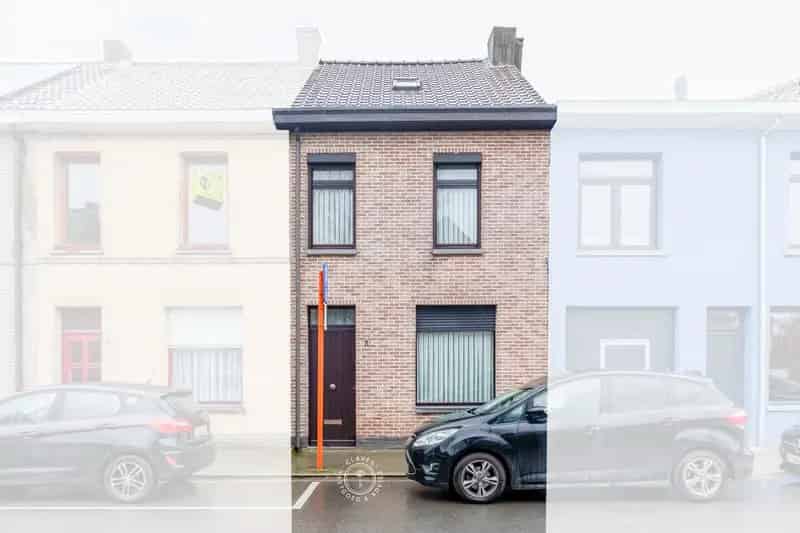 Goed onderhouden gezinswoning met tuin en achterdoorgang