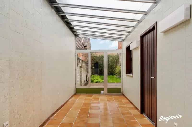 Ruime, verzorgde rijwoning met 4 slaapkamers, tuin en garage op centrale ligging te Menen