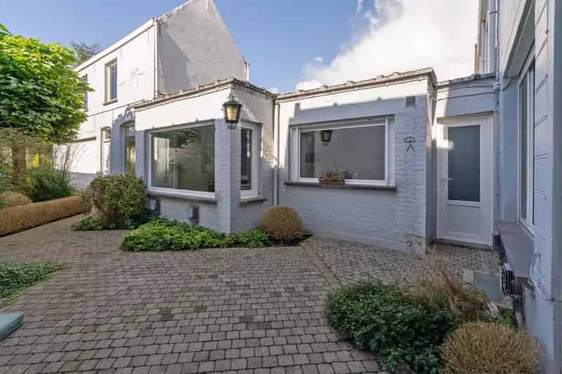Karaktervolle ruime woning  met bijgebouw/atelier en stadstuin in het centrum
