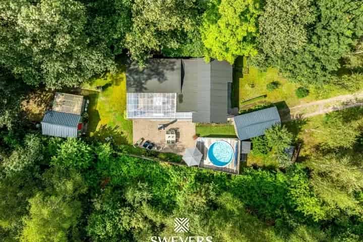 Idyllische vakantiewoning op groen perceel van 19a99ca in het gegeerde Bolderberg