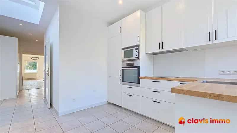 Charmante twee-gevel woning met 2 SLK, bureau, terras en tuin