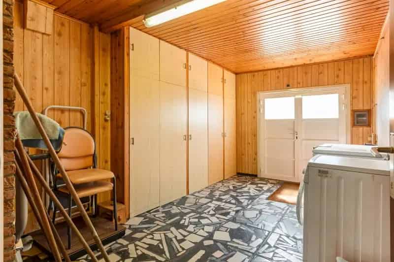 Tof gelegen, te renoveren woning met 2 slpk., garage en tuin