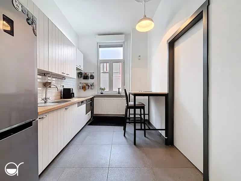 Rijwoning met terras en 3 slaapkamers