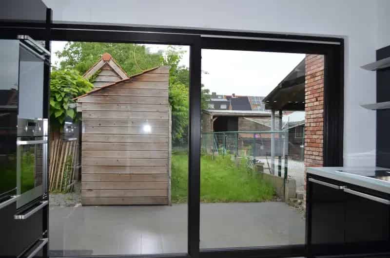 Volledig gerenoveerde woning in het centrum met stadstuintje.