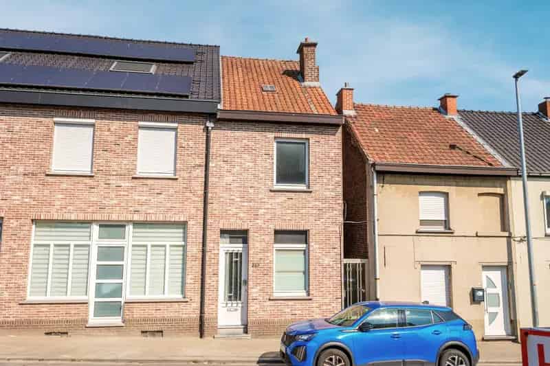 Op te frissen woning met 2 à 3 slpk en tuin te Buizingen.