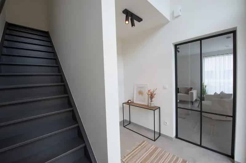 Moderne halfopen bebouwing (Lot 3) in RivaHof te Dentergem.