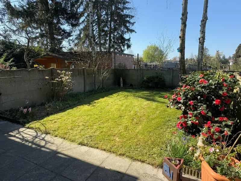 Bel-etagewoning met 3 slaapkamers, ruime garage en Zuid tuin