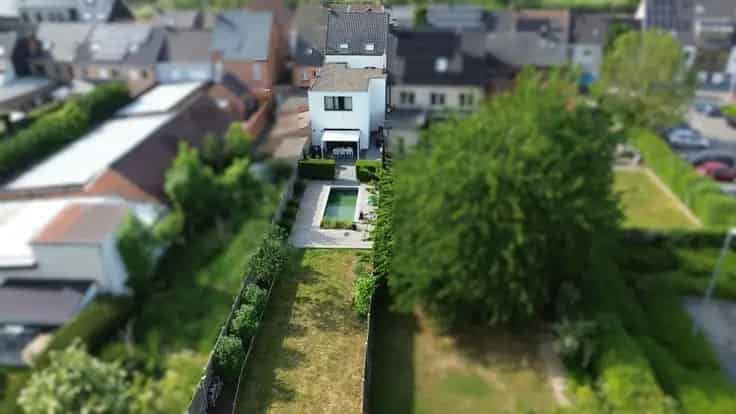 Huis Te Koop Schoonaarde: Ruime woning met zwemvijver