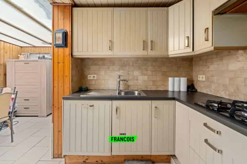Te renoveren woning met tuin nabij centrum Gavere te koop!