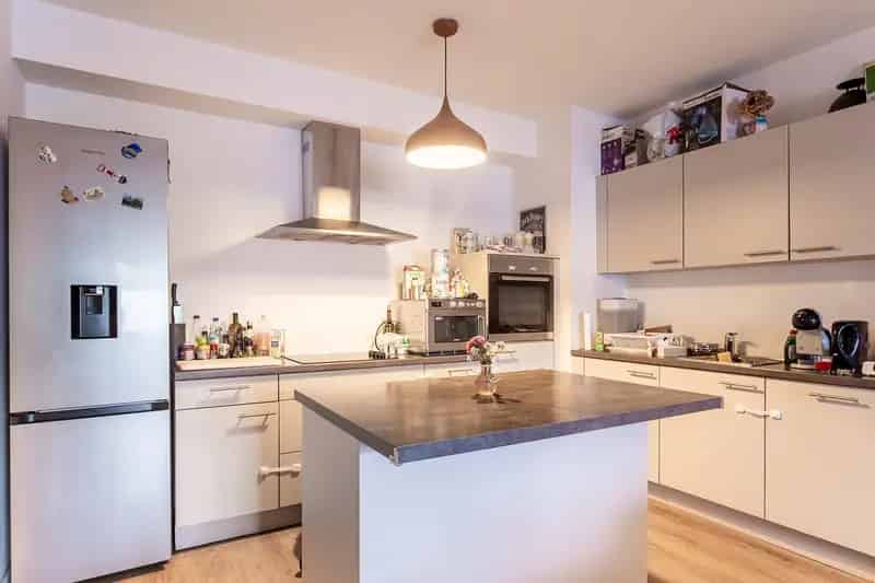Instapklaar appartement met 2 ruime slaapkamers, grote tuin en parking 8450953
