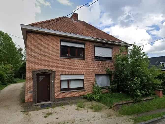 Halfopen bebouwing met tuin, carport en drie slaapkamers in Eksaarde