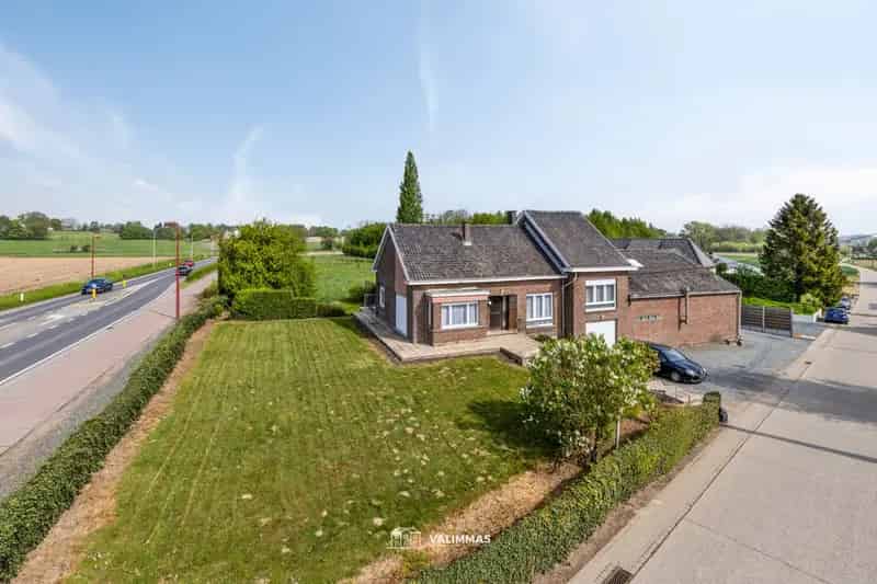 Ruime alleenstaande woning op ± 22 are, met atelier en tuin