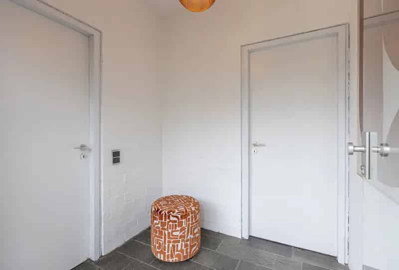 Opbrengstgebouw met 2 appartementen in residentiële wijk 
