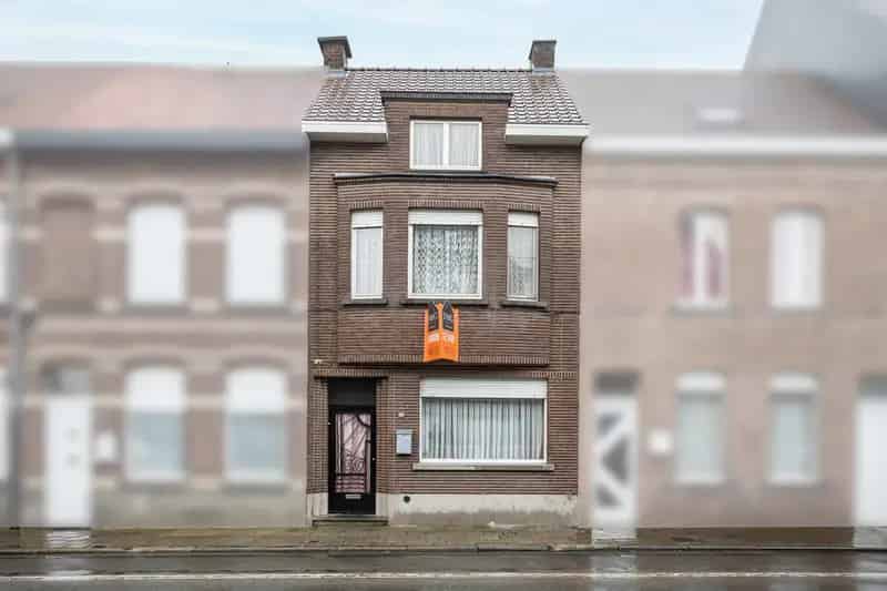 Woning met tuin en achterliggend perceel met oprit & garage!