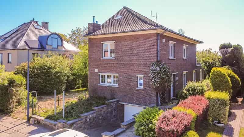 RUIME WONING MET 4 SLAAPKAMERS, GARAGE & ZUID-TUIN !