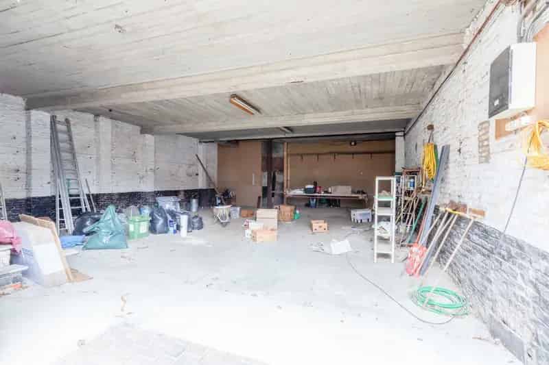 Magazijn met bovenverdieping, praktijkruimte én karaktervol herenhuis op strategische locatie