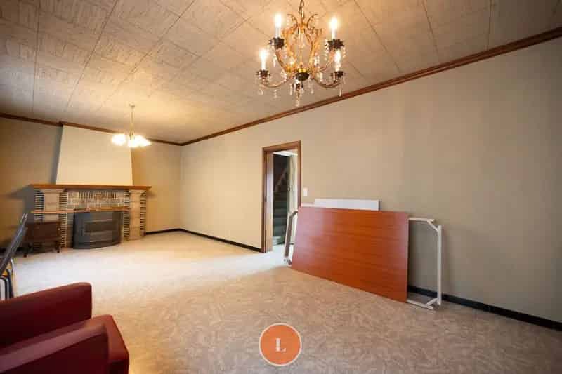 Te renoveren halfopen woning met 3 slaapkamer, garage op een perceel van net geen 1000m²