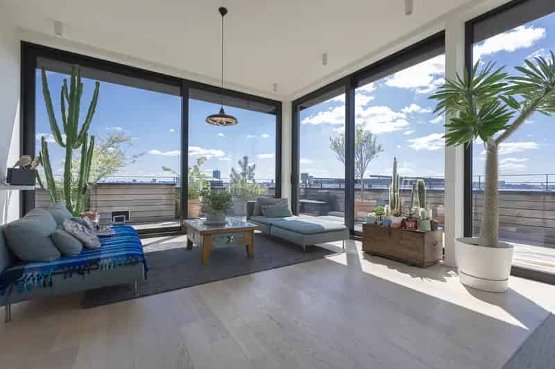 Penthouse met uitzonderlijke terrassen en plafondhoogte.