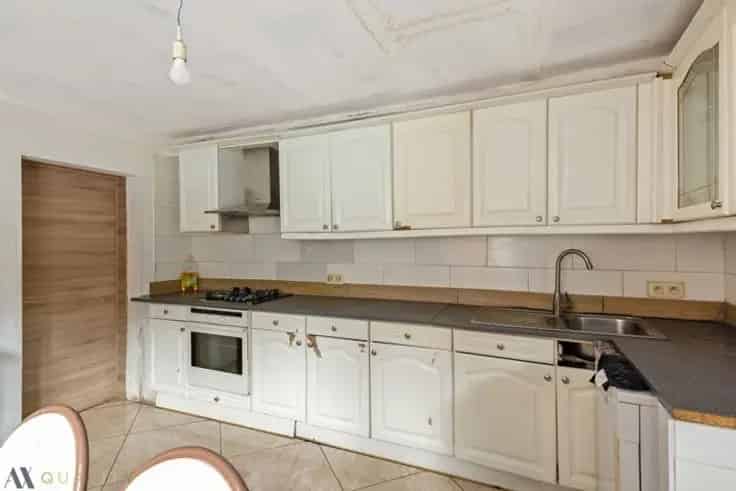 Rijwoning 5 slaapkamers centrum Lebbeke
