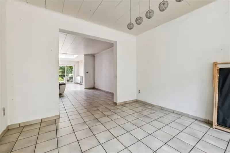 KNUSSE GEZINSWONING MET GEZELLIGE STADSTUIN IN HASSELT