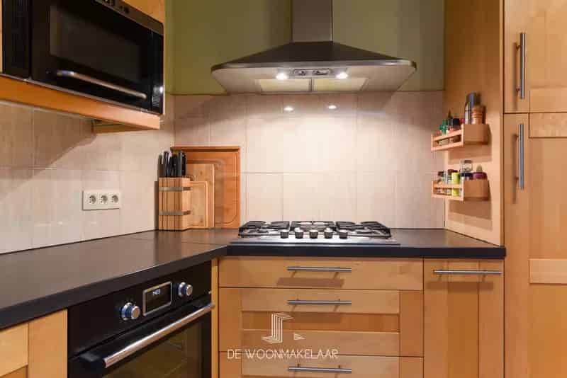 Woning met 3 slaapkamers, garage en zolder met potentieel