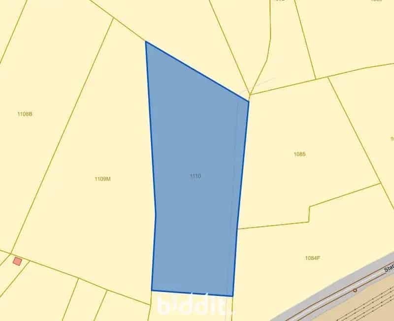 Een perceel landbouwgrond te Belsele (palend aan een ander)