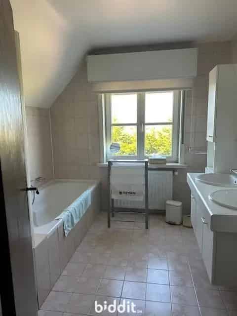 Ruime open bebouwing met gezellige tuin in Heusden te koop